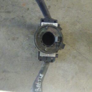 Front-facing view of a VW Beetle combination switch showing stalk and connector assembly.Front-facing view of