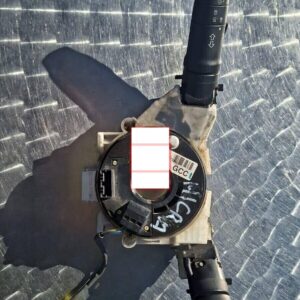 Used combination switch for Nissan Micra, angled view showing buttons and wiring connector on Brits Brothers™U