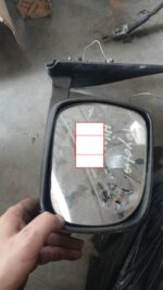 Right side door mirror for 2008 Toyota Hilux, angled slightly to show reflective surface and mounting points.R