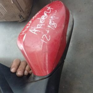 Used left side door mirror for Hyundai Accent shown from an angled front view.Used left side door mirror for H