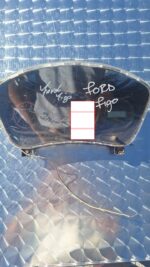 Front view of a car's speedometer and tachometer cluster with fuel and temperature gauges.Front view of a car'