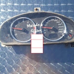 Front view of a car dashboard instrument cluster showing speedometer and tachometer gauges.Front view of a car