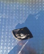 Left front corner light for Nissan Sentra, angled view showing lens and mounting area.Left front corner light