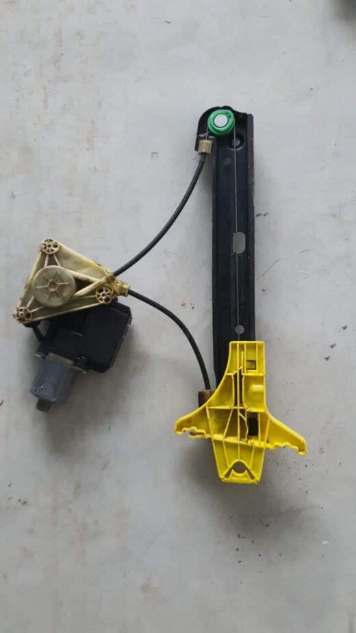 Vw Polo 6 Right Rear Window Mechanism Right rear window regulator mechanism for VW Polo 6, shown from an angled side view.Right rear window regulato