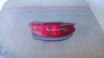 Rear bumper reflector for Toyota, shown front angle, clean and ready for installation.Rear bumper reflector fo