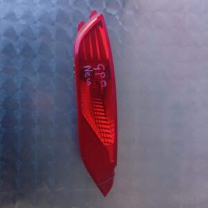 Rear left reflector for Hyundai Tucson shown from rear angle on plain white background.Rear left reflector for