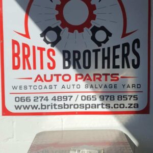 Front angled view of a new black spotlight designed for mounting on a Ford Ranger vehicle.Front angled view of