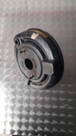 Front angled view of a Ford Ka brake booster showing the master cylinder attachment area.Front angled view of