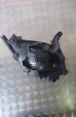 Used Renault Scenic fuse box shown from top angle with wiring connectors visible.Used Renault Scenic fuse box