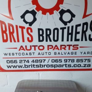 Used ABS pump for Mercedes W202 shown from side angle on white background.Used ABS pump for Mercedes W202 show