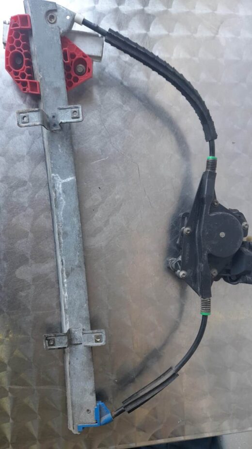 Ford Mondeo used window mechanism showing metal frame and cables from a slightly angled side view.Ford Mondeo
