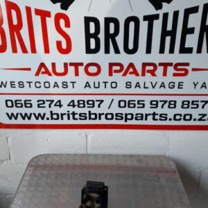 Front view of a 2L coil for a Ford Mondeo displayed on a plain background.Front view of a 2L coil for a Ford M
