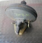 Brake booster for Mercedes W202 shown from front angle with visible vacuum hose connection.Brake booster for M