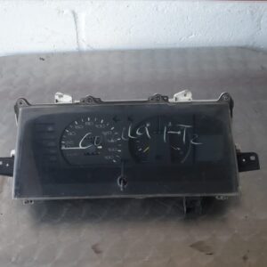 Front view of a car instrument cluster panel showing speedometer, tachometer, and gauges, clean and intact.Fro