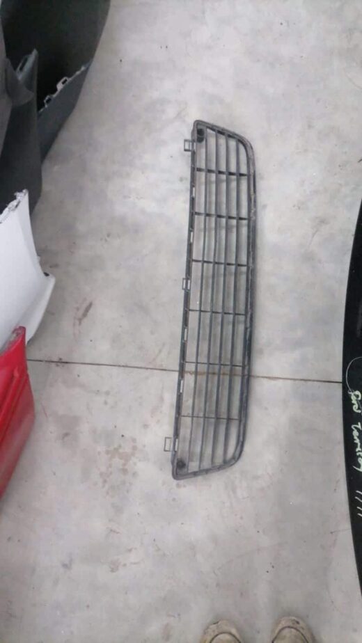 Vw Polo Front Bumper Grillwhatsapp Image 2023-09-26 At 01.43.18 Front view of a Toyota Hilux front bumper grill, clean and ready for installation.Front view of a Toyota Hilux