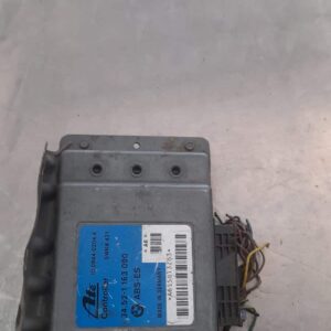 Used BMW 3 E36 ABS unit shown from front angle with connectors visible on a white surface.Used BMW 3 E36 ABS u