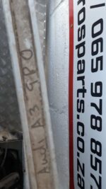 Right taillight viewed from the rear side, showing used condition with clear red and amber lenses.Right tailli