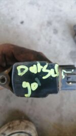 Front angled view of a new pencil coil designed for the Datsun Go engine system.Front angled view of a new pen