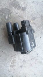 Used Renault Megane 1600 coil spring viewed from side showing full coil shape and mounting points.Used Renault