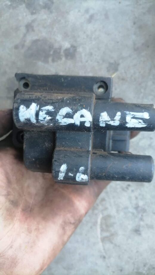 Renault Megane 1600 Coil Whatsapp Image 2023-10-03 At 20.47.31 Front view of a used 1600 coil for Renault Megane showing connectors and labeled details.Front view of a used