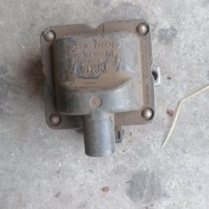 Front angle view of a VW vehicle coil spring displayed against a plain background as main product image.Front