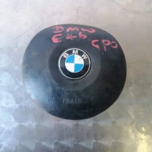 Front view of a used BMW steering wheel airbag with center emblem and attachment points visible.Front view of