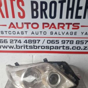 Used right side headlight for Toyota Fortuner, shown from front angle displaying lens and housing.Used right s