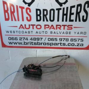 Front view of a used heater control unit for 1987 Toyota Corolla showing switch and dial panel.Front view of a