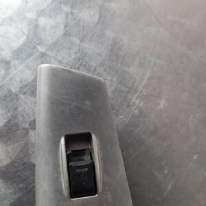Front angle of a clean Toyota Runx car window switch panel with four buttons displayed on white backgroundFron