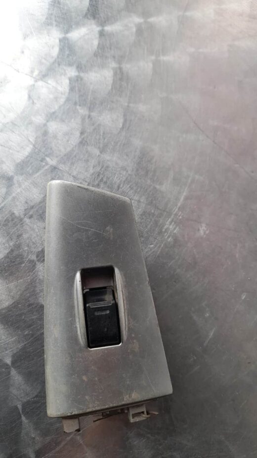 Toyota Runx Window Switch Front angle of a clean Toyota Runx car window switch panel with four buttons displayed on white backgroundFron
