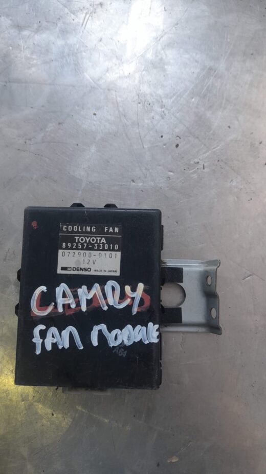 1996 Toyota Camry Radiator Fan Module 8925733010 Front angle of a radiator fan module for Toyota Camry, used condition, showing wiring and mounting points.Fron