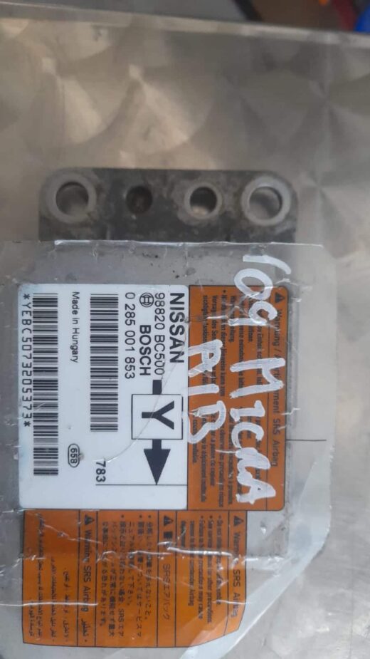 2009 Nissan Micra Airbag Module 98820Bc500 Front view of a Nissan Micra airbag module showing connector and mounting points, featured image.Front view of