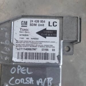 Front view of Opel Corsa C airbag control module with connectors and wiring harness visible.Front view of Opel