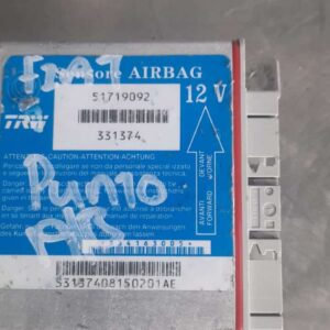 Front view of a Fiat Punto airbag module showing the deployed airbag and wiring harness.Front view of a Fiat P