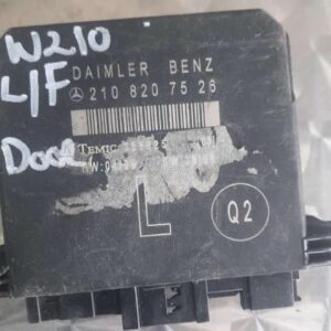 Front angle of a Mercedes-Benz W210 door lock module showing connector and mounting points.Front angle of a Me