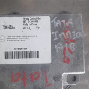 Front-facing view of a Tata Indica airbag module showing the compact black casing and wiring connection.Front-
