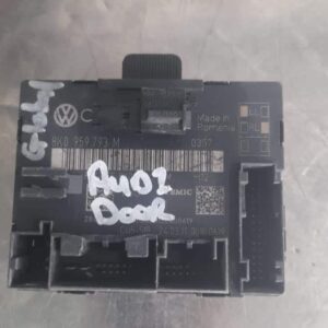 Front view of a used Audi Q5 front door control module showing wiring harness and connectors.Front view of a u