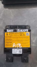 Front-facing view of a Ford Fiesta MK6 airbag control unit mounted on gray bracketFront-facing view of a Ford