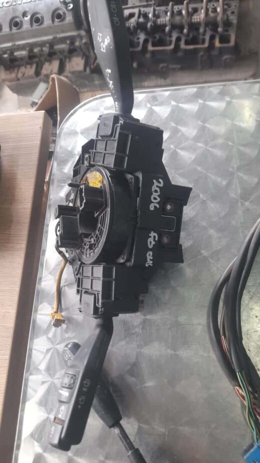 Whatsapp Image 2023-11-06 At 14.38.46 Front view of black automotive combination switch for steering column without condition specified.Front view o