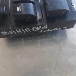 Front angled view of a black main window switch for Mahindra Genio, shown as featured image.Front angled view