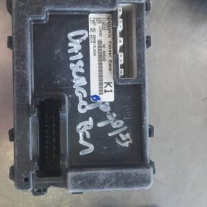 Front view of a blue compact car focusing on the front bumper cover in new condition.Front view of a blue comp