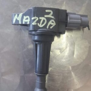 Front angle of a Mazda 2 coil spring, showing tightly wound metal coils in clean condition.Front angle of a Ma