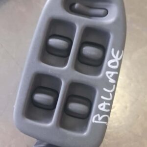 Main front angle of a black car window control switch panel with four buttons and a lock button.Main front ang