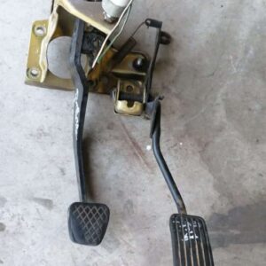 Close-up of three used vehicle pedals for Honda Ballade, showing accelerator, brake, and clutch parts.Close-up