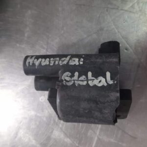 Front view of a new Hyundai ignition coil pack showing all four coil connectors aligned horizontally.Front vie