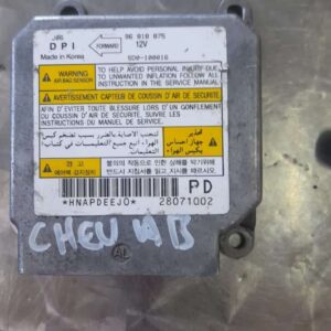 Front view of a Chevrolet Spark air bag module featuring the central airbag cushion and wiring harness.Front v