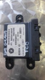 Front view of a PCD module for Jeep Grand Cherokee showing connectors and wiring in featured image.Front view