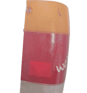 Right taillight lens for Ford Courier shown from rear angle on white background.Right taillight lens for Ford