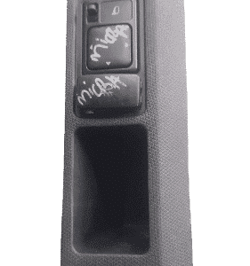 Front view of a new Nissan Micra side mirror switch with four buttons and a joystick control.Front view of a n