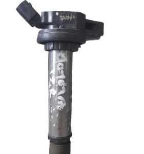 Front angle view of a black ignition coil for Toyota with mounting points visible.Front angle view of a black
